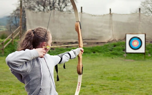 a person shooting a bow