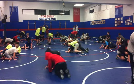 a group of people in a gym