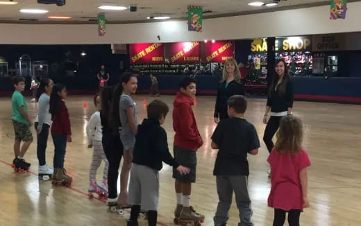 a group of people on an ice rink