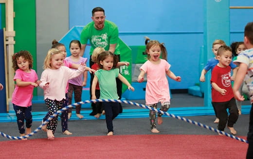 a group of children dancing