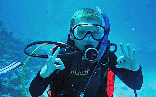 a person in scuba gear underwater