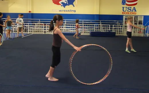 a person holding a hoop