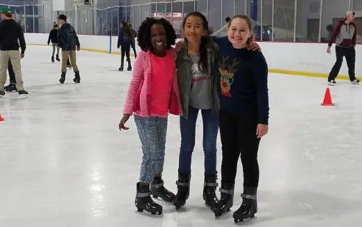 a group of women on ice