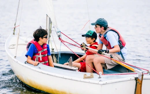 a group of people in a boat