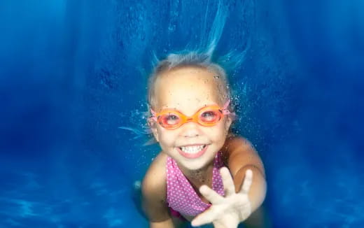 a baby wearing goggles