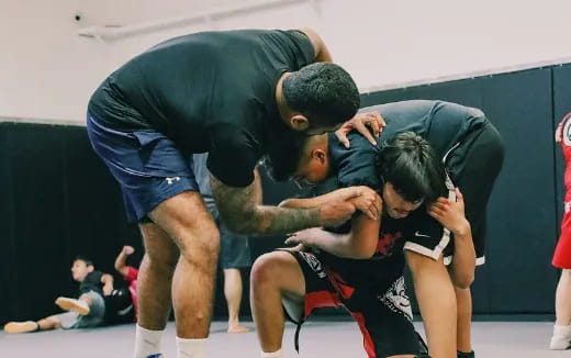 a group of men wrestling