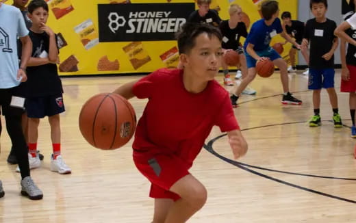 a boy playing basketball