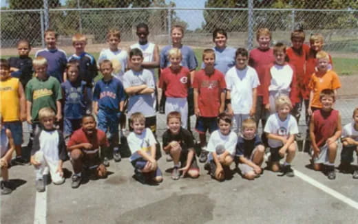 a group of people posing for a photo