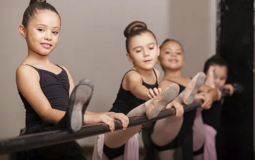 a group of children holding musical instruments