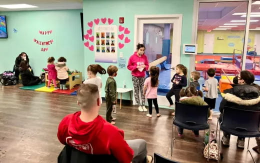 a group of children in a classroom