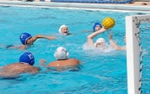 a group of people playing water polo