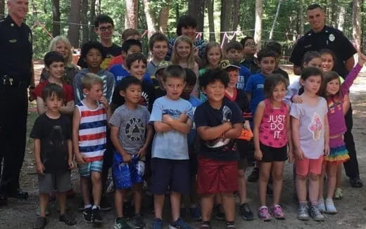 a group of children posing for a photo