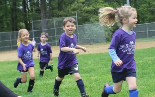 a group of girls playing football