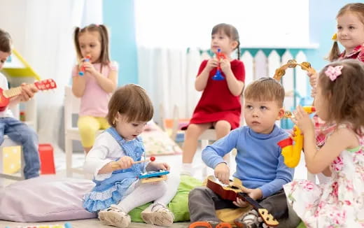 a group of children sitting on the floor