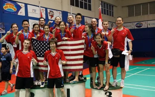 a group of people holding flags