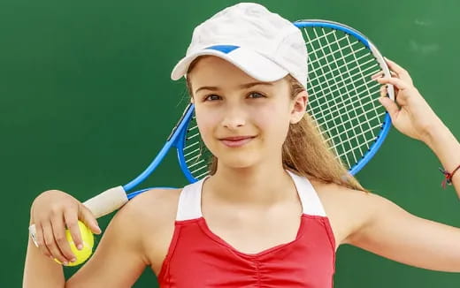 a girl playing tennis