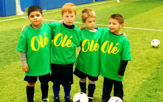 a group of boys in football uniforms