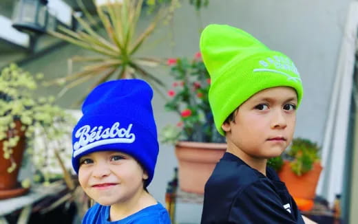 two children wearing hats