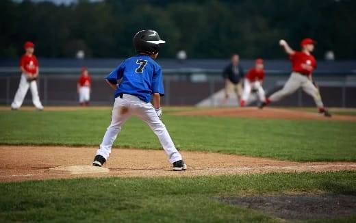 a kid running on a field