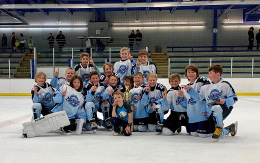 a group of people wearing hockey uniforms