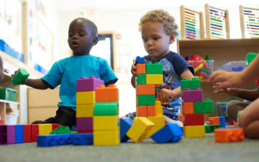 a few young boys playing with toys