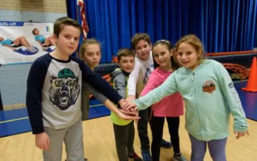 a group of children posing for a photo