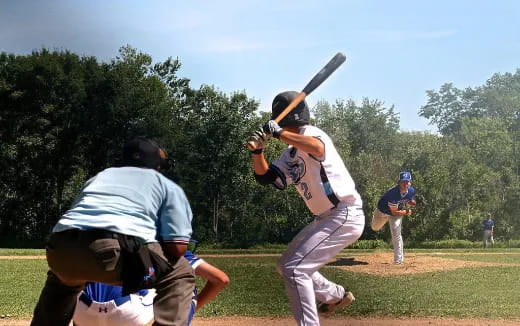 a baseball player up to bat at a baseball game