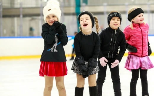 a group of girls wearing clothing