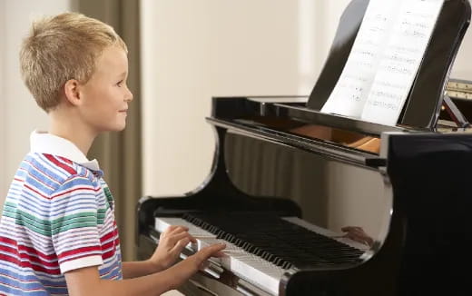 a child playing a piano