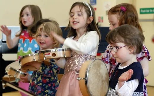 a group of children in clothing