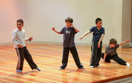 a group of boys in a room