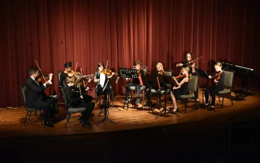 a group of people playing instruments