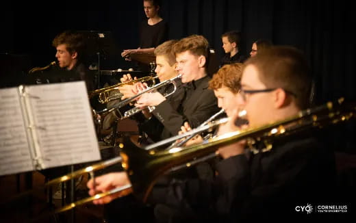 a group of people playing instruments