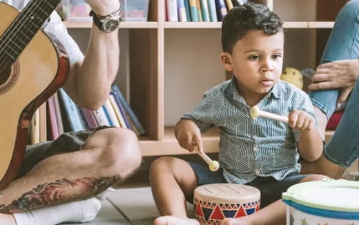 a child sitting on the floor