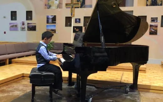 a person playing a piano