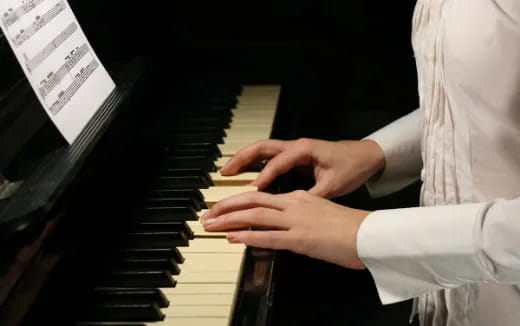 a person playing a piano