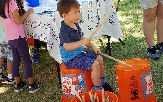 a child painting outside