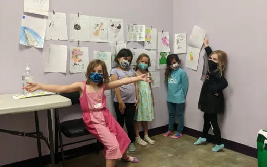 a group of children in a classroom