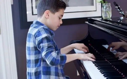 a person playing a piano