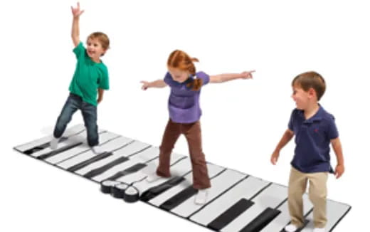 a group of children jumping on a trampoline