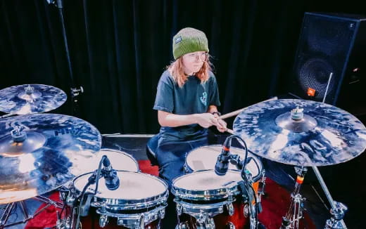 a person playing the drums