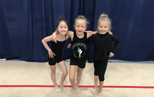 a group of girls posing for a picture