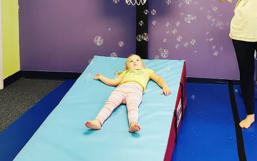 a child on a mat