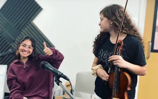 a person playing a violin