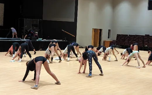 a group of people doing yoga