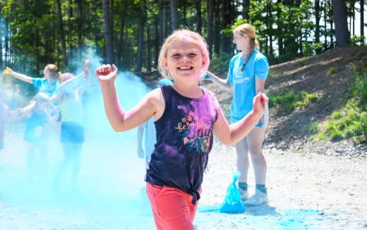 a girl running in a pool