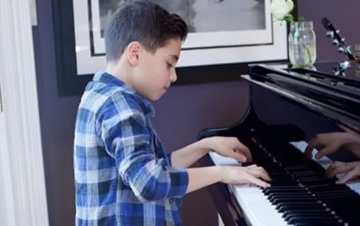 a man playing a piano