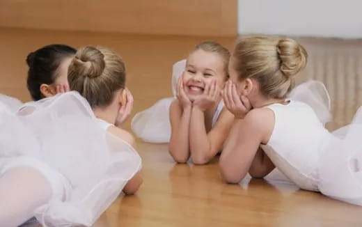 a group of people sitting on the floor