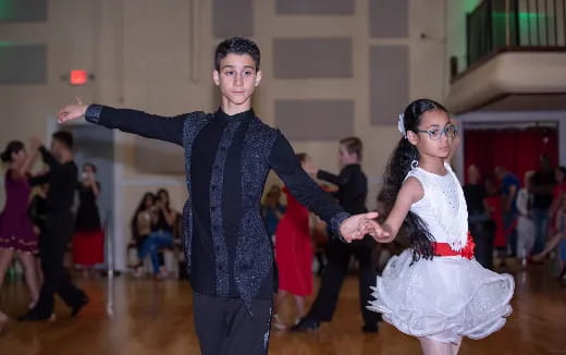 a man and a woman dancing