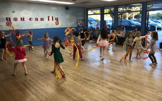 a group of children dancing